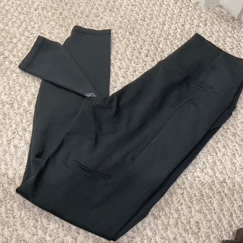 Greatness wins high waisted black leggings with matching deep v back bra top